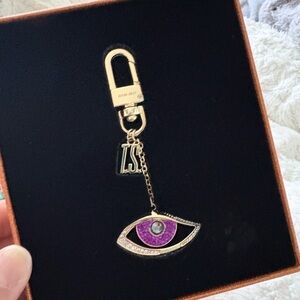 Purple Eye Keychain by [Taylor Swift]